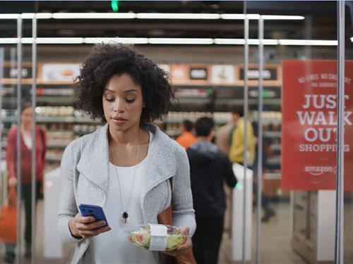 woman leaving Amazon Go store